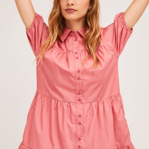 Model wearing pink cotton dress